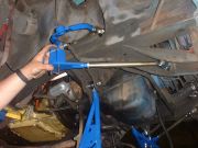 Install adjustable strut rod